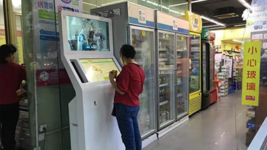 What are the main uses of touch inquiry machines in supermarkets?